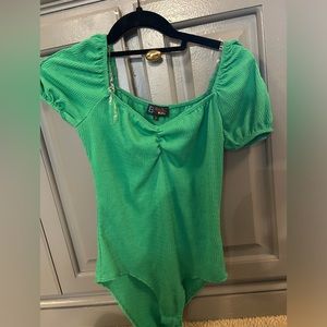 green bodysuit